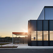 View of the office side of the factory at dusk