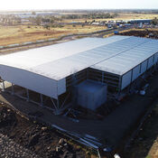 An aerial view of the Calendar Cheese factory construction site, with the building exterior being completed.