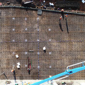 An aerial view of construction workers at the Calendar Cheese factory construction site.